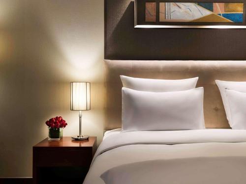 Imagen de la habitación del Hotel Pullman Beijing South. Foto 20