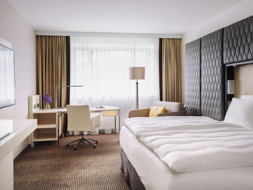 Imagen de la habitación del Hotel Pullman Berlin Schweizerhof. Foto 16