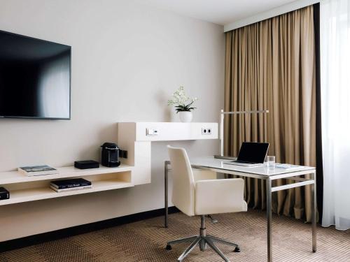 Imagen de la habitación del Hotel Pullman Berlin Schweizerhof. Foto 17