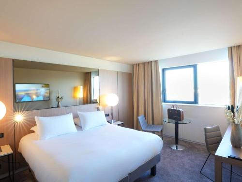 Imagen de la habitación del Hotel Pullman Bordeaux Lac. Foto 12