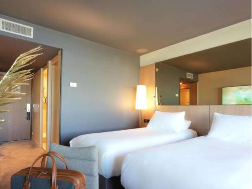 Imagen de la habitación del Hotel Pullman Bordeaux Lac. Foto 15