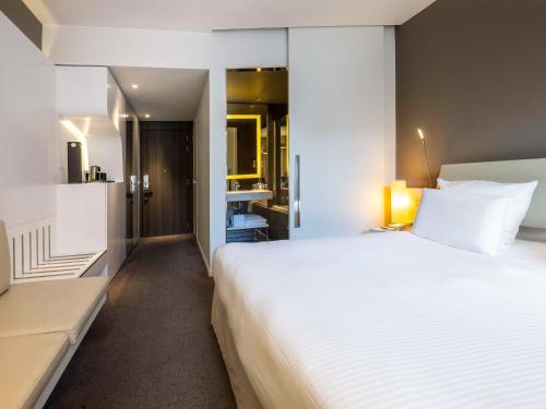 Imagen de la habitación del Hotel Pullman Brussels Midi. Foto 17