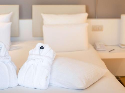 Imagen de la habitación del Hotel Pullman Brussels Midi. Foto 20