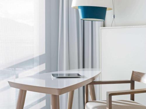 Imagen de la habitación del Hotel Pullman Cannes Mandelieu. Foto 13