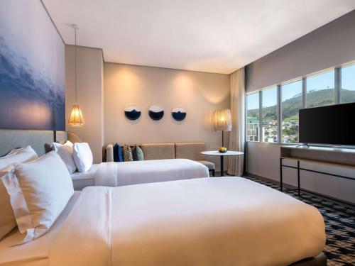 Imagen de la habitación del Hotel Pullman Cape Town City Centre. Foto 9