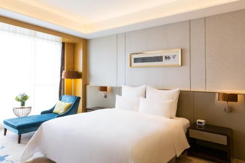Imagen de la habitación del Hotel Pullman Changshu Leeman. Foto 13