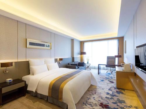 Imagen de la habitación del Hotel Pullman Changshu Leeman. Foto 17
