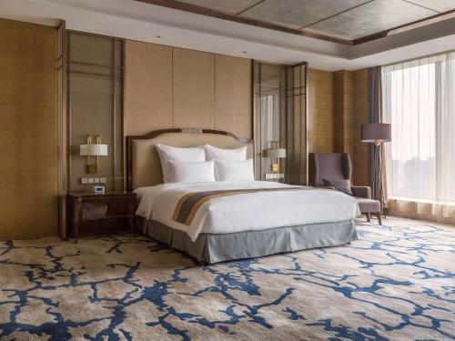 Imagen de la habitación del Hotel Pullman Changshu Leeman. Foto 18