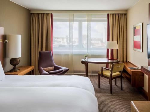 Imagen de la habitación del Hotel Pullman Cologne. Foto 11