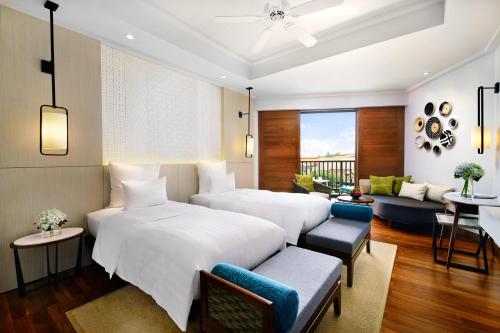 Imagen de la habitación del Hotel Pullman Danang Beach Resort. Foto 9