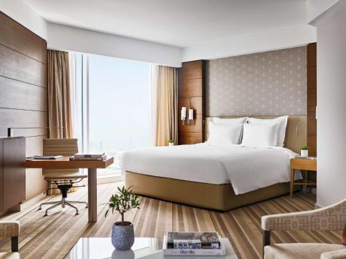 Imagen de la habitación del Hotel Pullman Doha West Bay. Foto 18