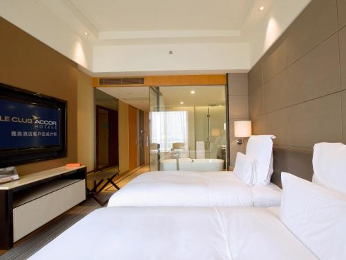 Imagen de la habitación del Hotel Pullman Dongguan Changan. Foto 16