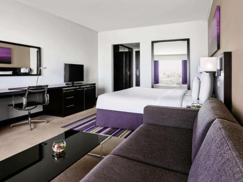 Imagen de la habitación del Hotel Pullman Dubai Creek City Centre. Foto 10