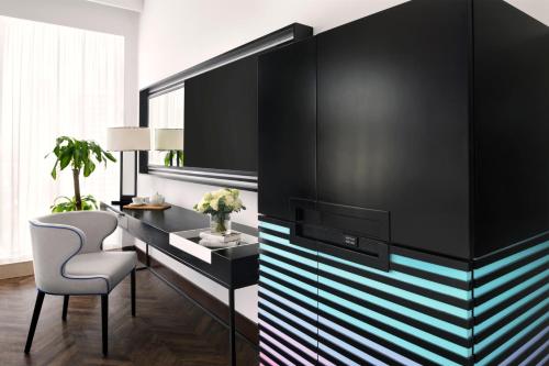 Imagen de la habitación del Hotel Pullman Dubai Downtown. Foto 8