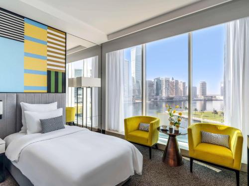 Imagen de la habitación del Hotel Pullman Dubai Downtown. Foto 12