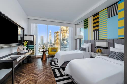 Imagen de la habitación del Hotel Pullman Dubai Downtown. Foto 13