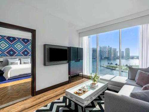 Imagen de la habitación del Hotel Pullman Dubai Downtown. Foto 17