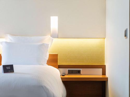 Imagen de la habitación del Hotel Pullman Eindhoven Cocagne. Foto 9