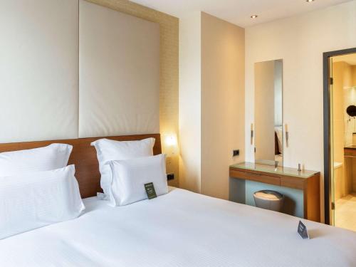 Imagen de la habitación del Hotel Pullman Eindhoven Cocagne. Foto 18