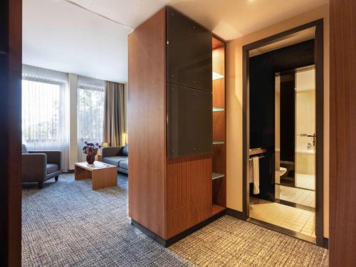 Imagen de la habitación del Hotel Pullman Eindhoven Cocagne. Foto 19