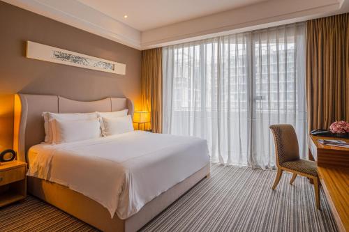 Imagen de la habitación del Hotel Pullman Foshan Shunde. Foto 5