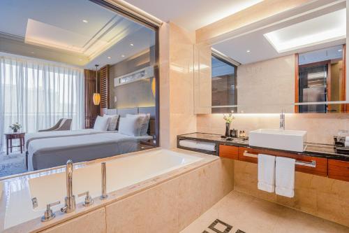 Imagen de la habitación del Hotel Pullman Foshan Shunde. Foto 11