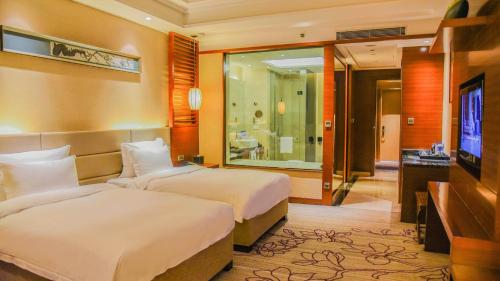 Imagen de la habitación del Hotel Pullman Foshan Shunde. Foto 16