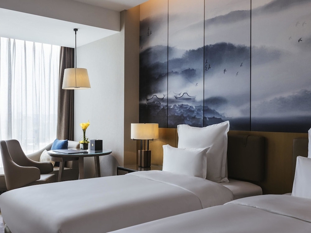 Imagen de la habitación del Hotel Pullman Fuzhou Tahoe. Foto 6