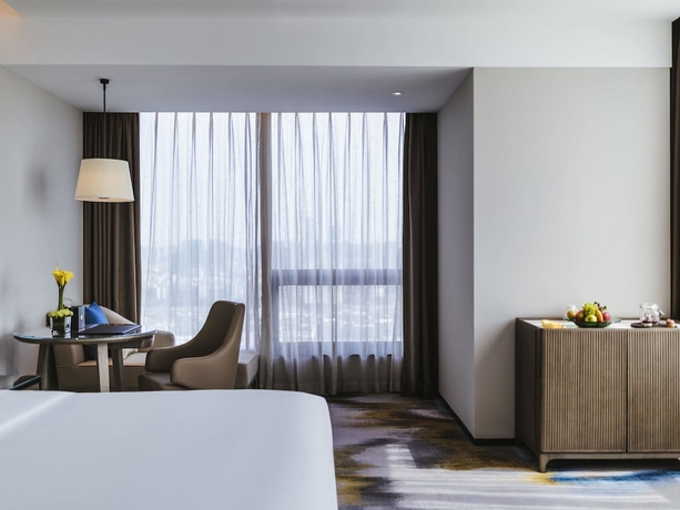 Imagen de la habitación del Hotel Pullman Fuzhou Tahoe. Foto 9