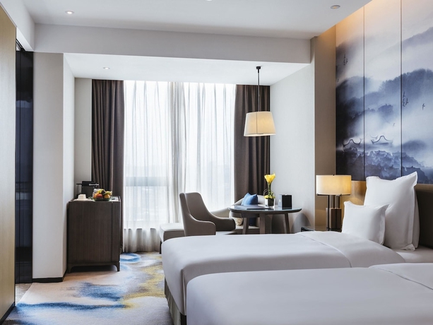 Imagen de la habitación del Hotel Pullman Fuzhou Tahoe. Foto 12
