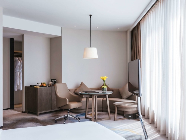 Imagen de la habitación del Hotel Pullman Fuzhou Tahoe. Foto 15