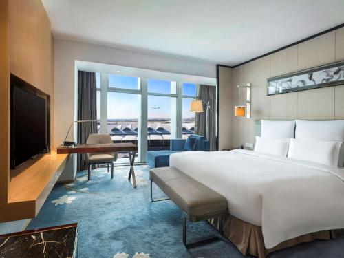 Imagen de la habitación del Hotel Pullman Guangzhou Baiyun Airport. Foto 17