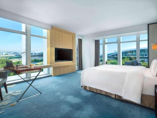 Imagen de la habitación del Hotel Pullman Guangzhou Baiyun Airport. Foto 18