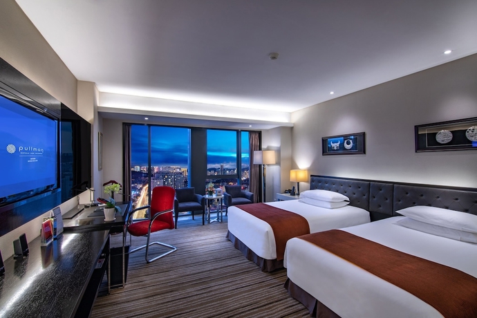 Imagen de la habitación del Hotel Pullman Guiyang. Foto 2