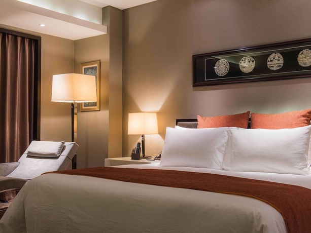 Imagen de la habitación del Hotel Pullman Guiyang. Foto 4