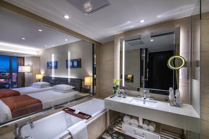 Imagen de la habitación del Hotel Pullman Guiyang. Foto 5
