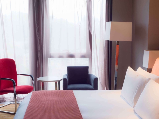 Imagen de la habitación del Hotel Pullman Guiyang. Foto 10