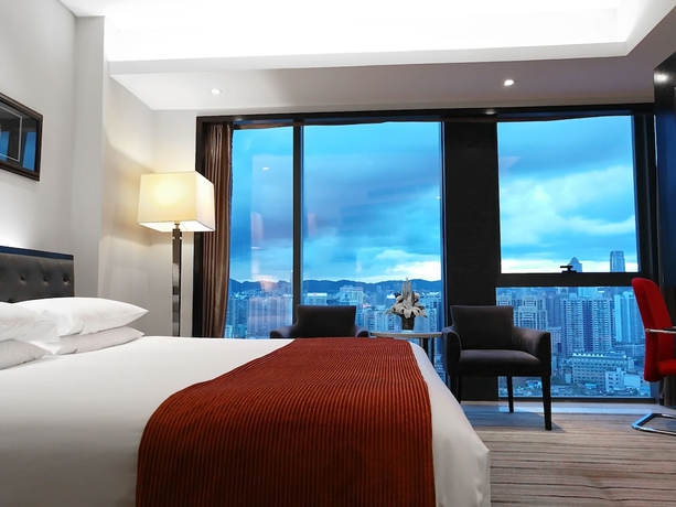 Imagen de la habitación del Hotel Pullman Guiyang. Foto 11