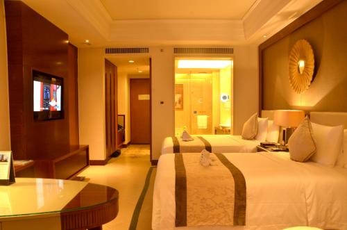 Imagen de la habitación del Hotel Pullman Haikou. Foto 5