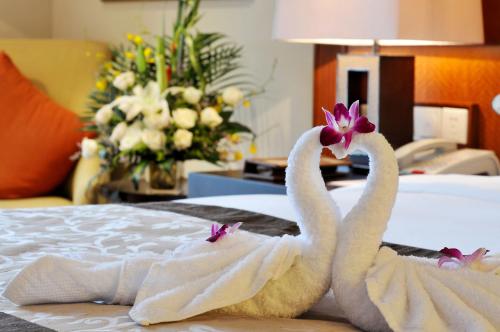 Imagen de la habitación del Hotel Pullman Haikou. Foto 7