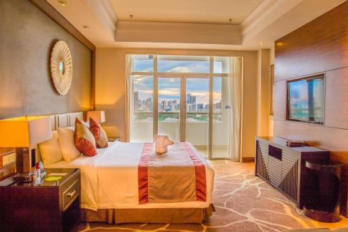 Imagen de la habitación del Hotel Pullman Haikou. Foto 8