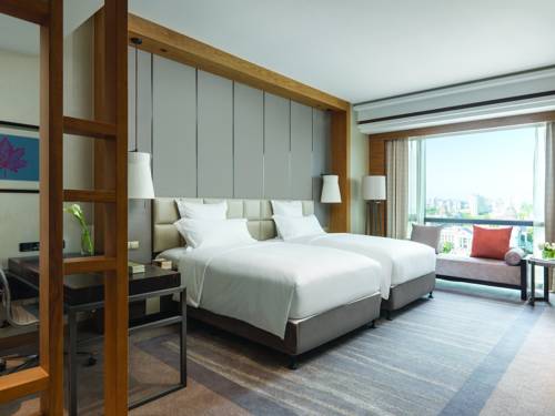 Imagen de la habitación del Hotel Pullman Haining. Foto 9