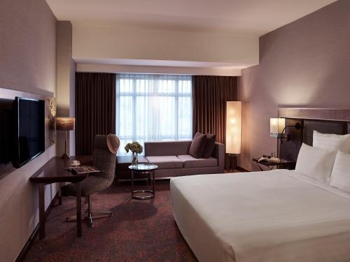 Imagen de la habitación del Hotel Pullman Hanoi. Foto 6