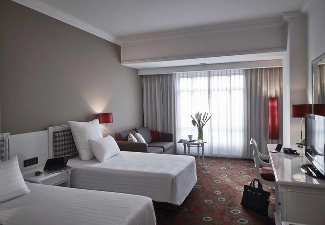 Imagen de la habitación del Hotel Pullman Hanoi. Foto 8