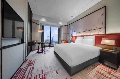 Imagen de la habitación del Hotel Pullman Huizhou Kaisa. Foto 6