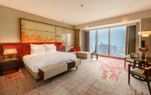 Imagen de la habitación del Hotel Pullman Huizhou Kaisa. Foto 7