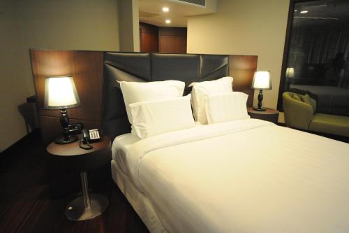 Imagen de la habitación del Hotel Pullman Istanbul and Convention Center. Foto 14