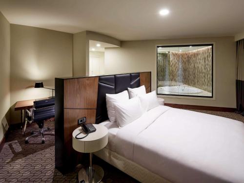 Imagen de la habitación del Hotel Pullman Istanbul and Convention Center. Foto 19