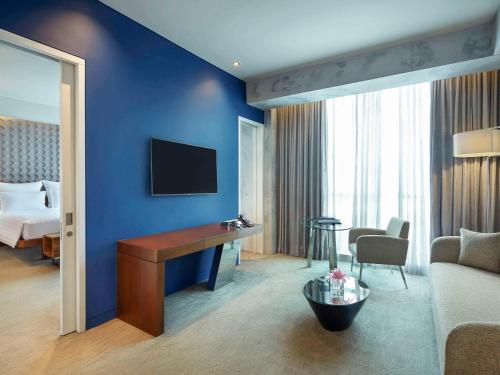 Imagen de la habitación del Hotel Pullman Jakarta Central Park. Foto 17