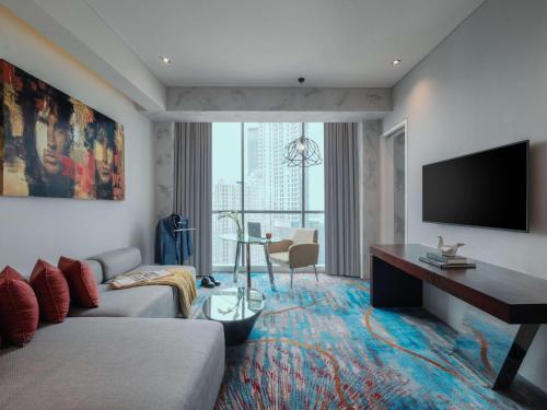 Imagen de la habitación del Hotel Pullman Jakarta Central Park. Foto 20